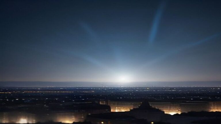Bright flash on the horizon over a night city under a dark sky